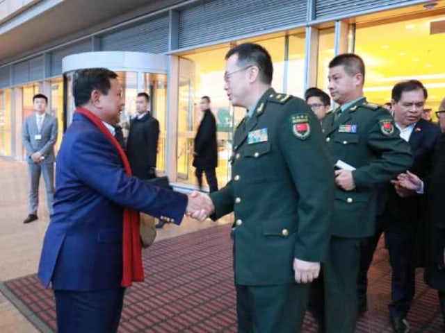 Menteri Pertahanan Prabowo Subianto (kiri) saat kunjungan ke Tiongkok, Minggu (15/12). Foto: Dok. KBRI Beijing