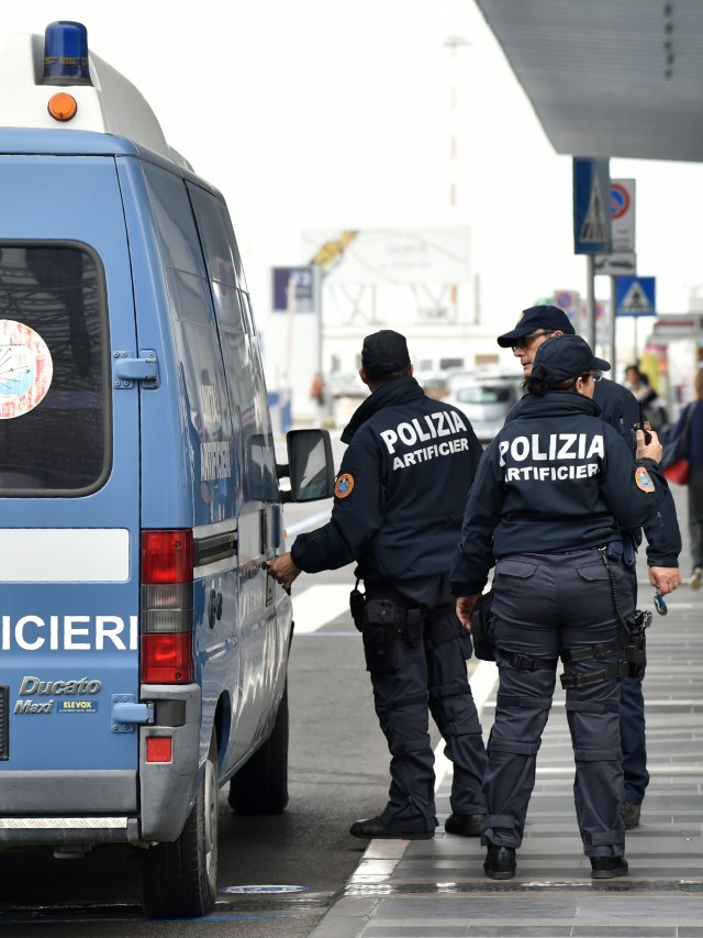 Ilustrasi Polisi Italia. Foto: AFP/TIZIANA FABI