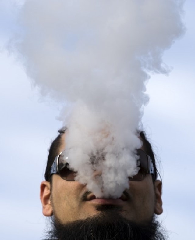 Ilustrasi vape Foto: AFP/Jose Luis Magana