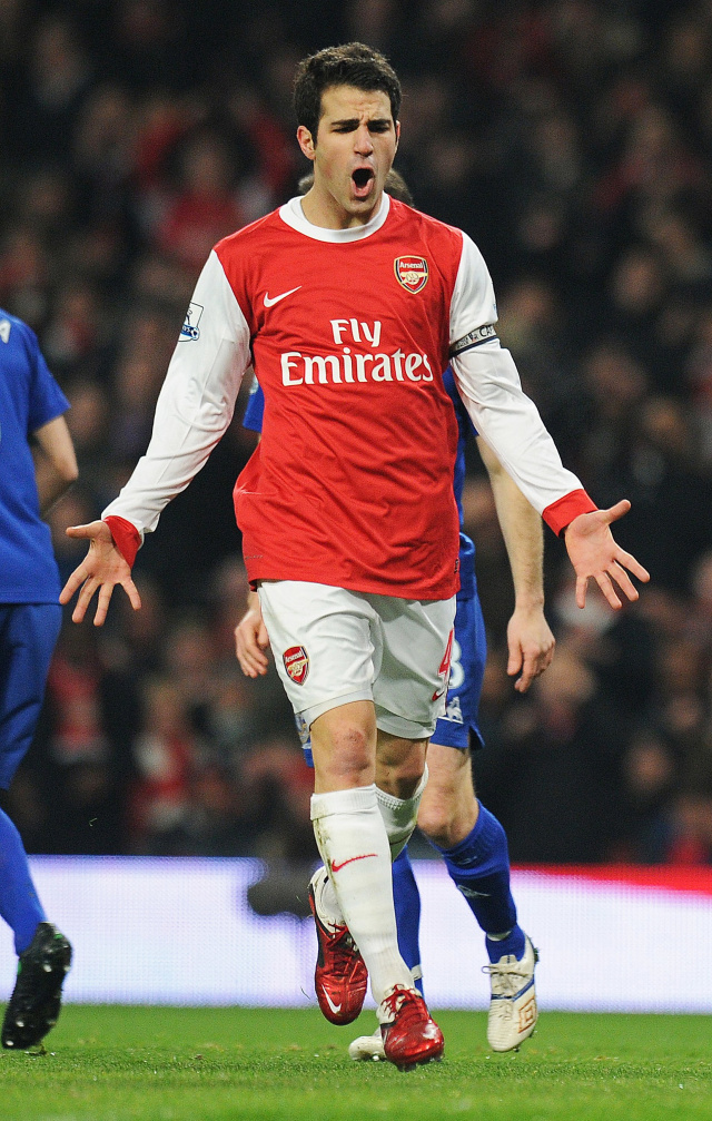 Cesc Fabregas saat berkostum Arsenal. Foto: AFP/CARL DE SOUZA
