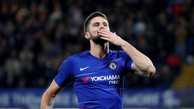 Olivier Giroud rayakan golnya ke gawang PAOK. (Foto: Action Images via Reuters/Peter Cziborra)