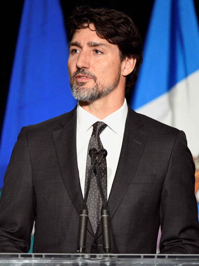 Perdana Menteri Kanada Justin Trudeau menghadiri upacara peringatan di Universitas Alberta. Foto: REUTERS/Candace Elliott