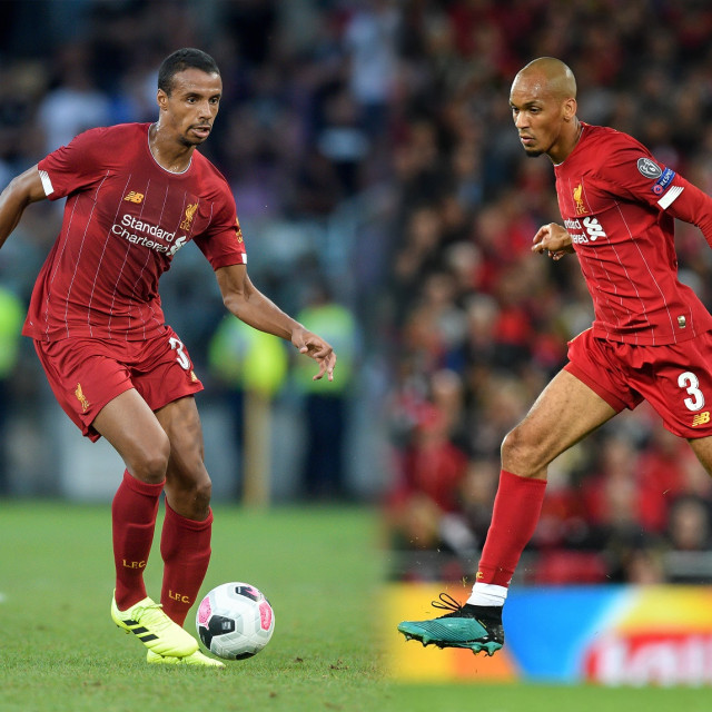 Matip (kanan) dan Fabinho (kiri), dua andalan Liverpool. Foto: Oli SCARFF / AFP