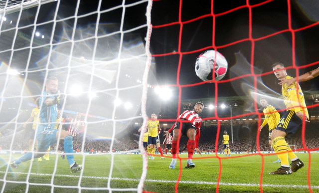 Gol Lys Mousset ke gawang Arsenal. Foto: Reuters/Carl Recine
