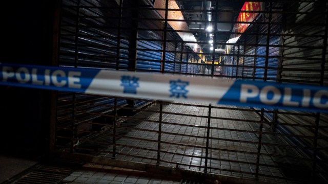 Tim Tanggap Darurat Hygiene Wuhan melakukan identifikasi di Pasar Makanan Laut Haunan lokasi terdeksi Virus Corona di Wuhan, Hubei, China. Foto: AFP/NOEL CELIS