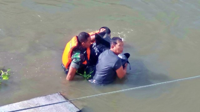 Seorang bocah warga Kelurahan Molosifat W, Kecamatan Kota Barat, Kota Gorontalo, tenggelam di sungai Bulango. Selasa, (21/1). Foto: Dok istimewa