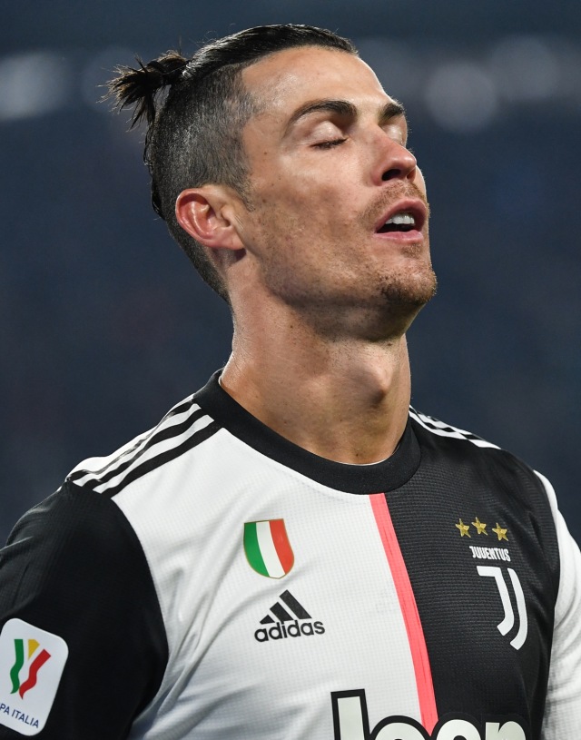 Cristiano Ronaldo di pertandingan Coppa Italia 2019/20 melawan Roma. Foto: AFP/Marco Bertorello