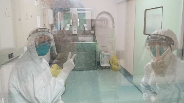 Foto: Melihat Tim Medis RS Wuhan di China Tangani Virus Corona (406198)