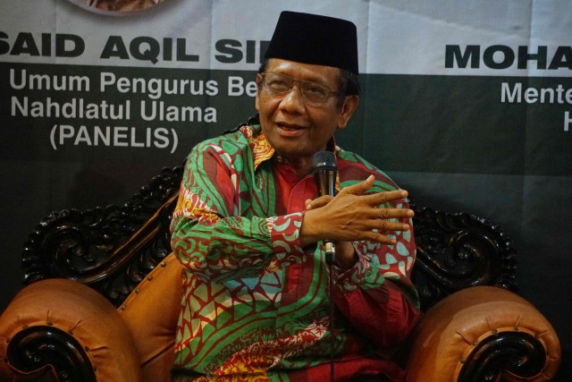 Menkopolhukam Mahfud MD di acara diskusi "harapan baru dunia Islam" meneguhkan hubungan Indonesia-Malaysia di Gedung PBNU, Jakarta.  Foto: Irfan Adi Saputra/kumparan