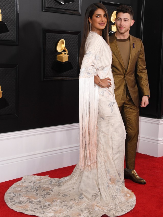 Aktris India Priyanka Chopra dan Nick Jonas menghadiri Grammy Awards ke-62 di Los Angeles, Amerika Serikat.  Foto: AFP/VALERIE MACON