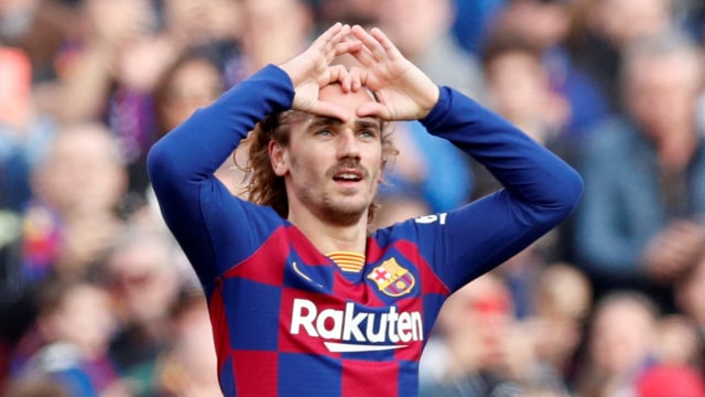 Selebrasi pemain FC Barcelona Antoine Griezmann usai mencetak gol ke gawang Getafe pada pertandingan lanjutan La Liga di Camp Nou, Spanyol. Foto: REUTERS / Albert Gea