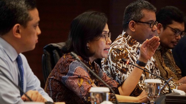 Menteri Keuangan Sri Mulyani (kedua kiri) memaparkan realisasi APBN 2020 di Kementerian Keuangan, Jakarta, Rabu (19/2). Foto: Irfan Adi Saputra/kumparan