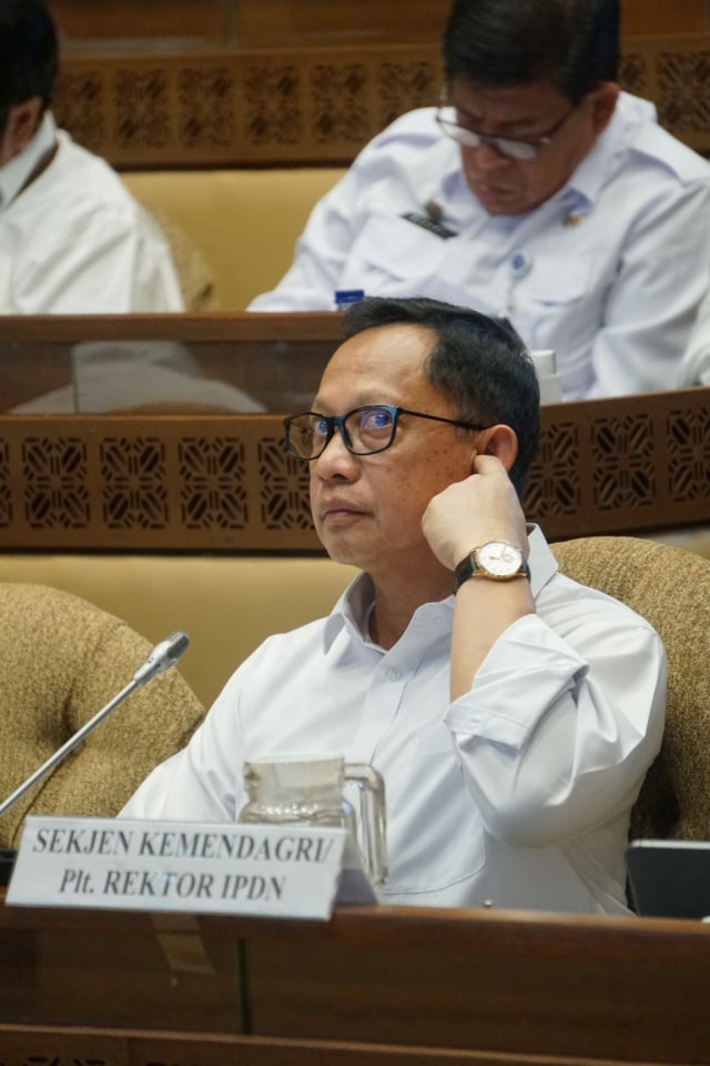 Mendagri Tito Karnavian saat menghadiri rapat bersama Komisi II DPR RI di Komplek Parlemen, Jakarta, Rabu (26/2). Foto: Fanny Kusumawardhani/kumparan 
