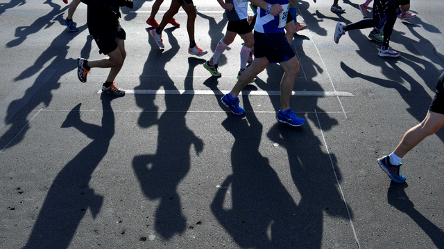 Ilustrasi lari marathon. Foto: AFP PHOTO / John MACDOUGALL