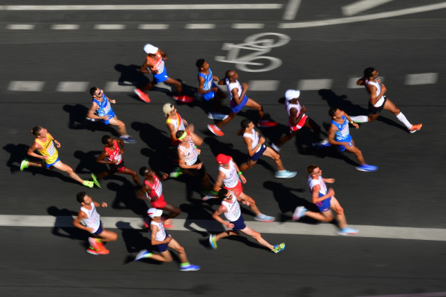 Ilustrasi lari marathon. Foto: AFP/Andrej ISAKOVIC