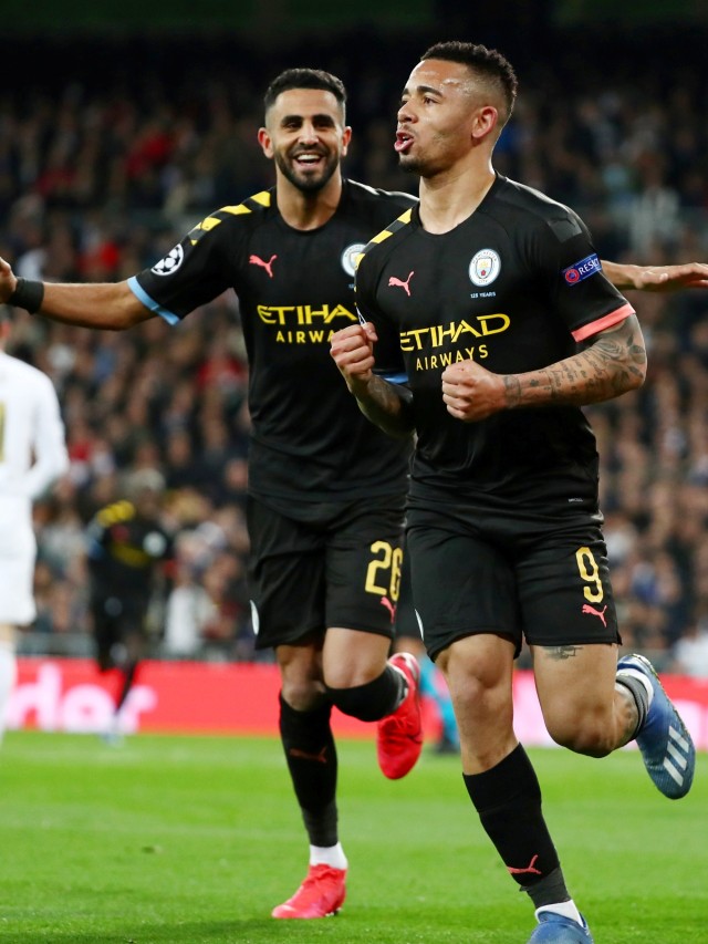 Pemain Manchester City, Gabriel Jesus dan Riyad Mahrez (kiri) merayakan gol pertama mereka ke gawang Real Madrid. Foto: REUTERS/Sergio Perez