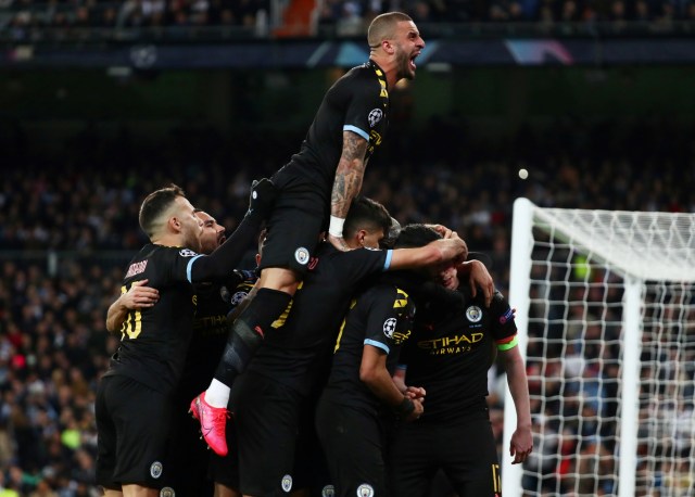 Pemain Manchester City berselebrasi. Foto: REUTERS/Sergio Perez