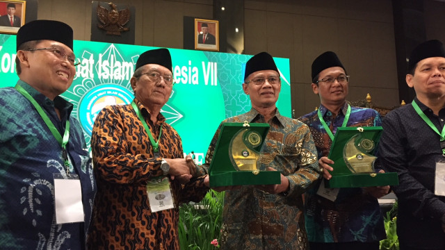 Ketua Umum PP Muhammadiyah Haedar Nashir (kedua kiri) saat menghadiri Kongres Umat Islam Indonesia di Bangka Belitung. Foto: Andesta Herli Wijaya/kumparan