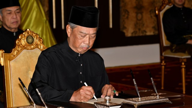 Muhyiddin Yassin saat upacara pelantikan sebagai perdana menteri ke-8 Malaysia di Kuala Lumpur, Malaysia, Minggu  (1/3). Foto: Malaysia Information Department/Maszuandi Adnan via REUTERS 