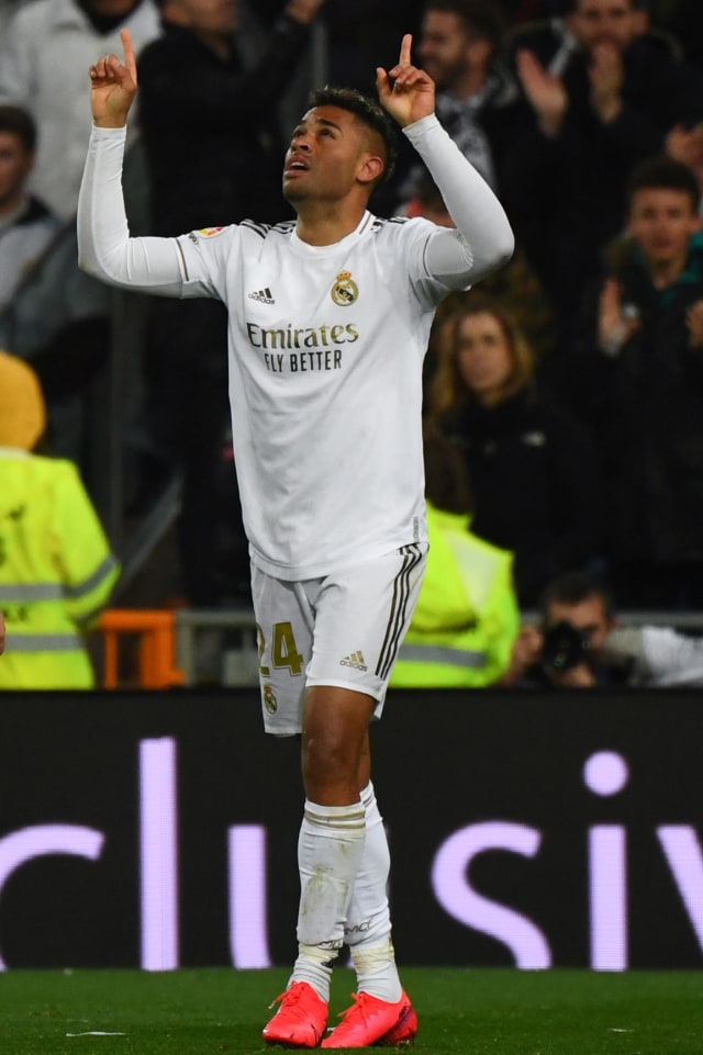 Mariano Diaz merayakan gol di El Clasico. Foto: GABRIEL BOUYS / AFP