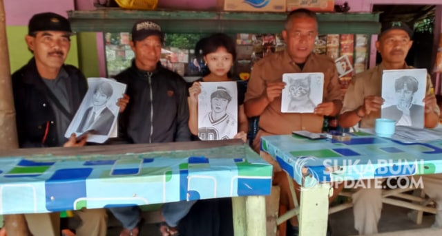 Pemdes Bojongjengkol bersama Muspika Jampang Tengah, memperlihatkan gambar buatan Peby Ayu Arianti. | Sumber Foto:Ragil Gilang