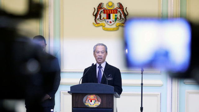 Perdana Menteri Malaysia Muhyiddin Yassin saat umumkan susunan kabinet baru di Putrajaya, Malaysia. Foto: REUTERS / Lim Huey Teng