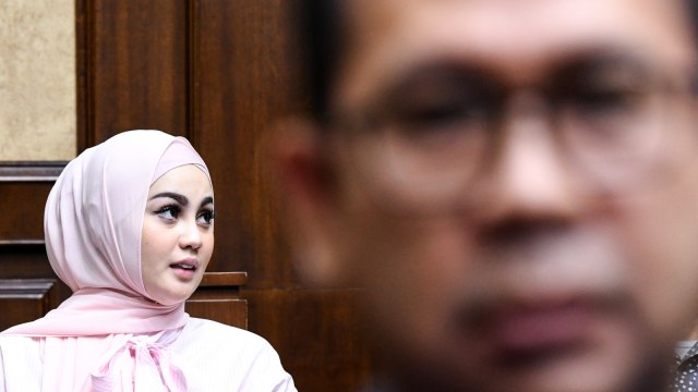 Jennifer dunn menjadi saksi pada sidang lanjutan Tubagus Chaeri Wardana di Pengadilan Tipikor, Jakarta, Kamis (12/3). Foto: ANTARA FOTO/M Risyal Hidayat