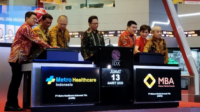 IPO PT Metro Healthcare Tbk (CARE) dan PT Makmur Berkah Amanda Tbk (AMAN) di BEI, Jakarta, Jumat (13/3).  Foto: Dok. Bursa Efek Indonesia