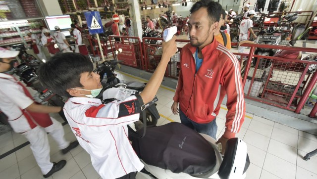Cara Diler Motor Tangkal Penyebaran Virus Corona (12758)