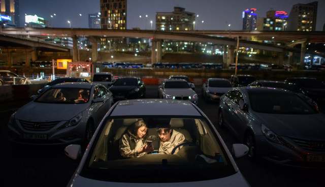 Suasana Bioskop Drive-In di Korea Selatan Foto: AFP/Ed Jones