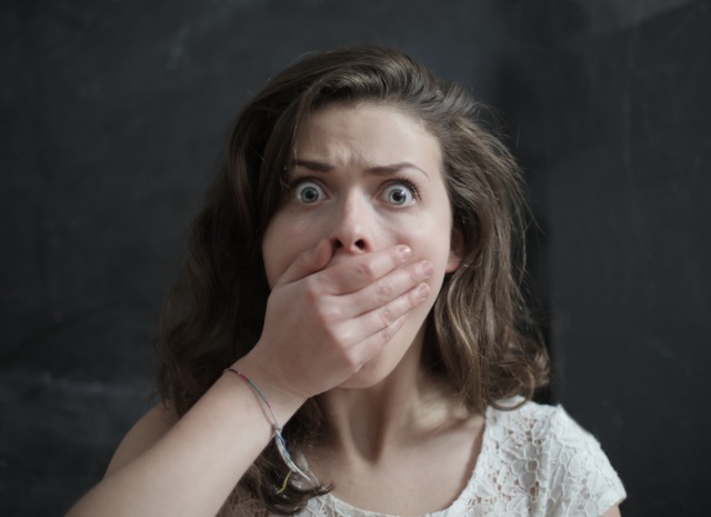 woman-covering-her-mouth-3986935.jpg