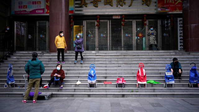 Jalanan Wuhan Kembali Ramai Foto: REUTERS/Aly Song
