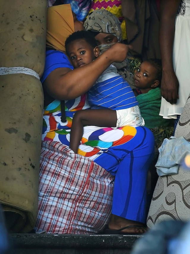 Imigran asing yang di bubarkan dari Gereja Metodis Sentral di Cape Town, Sourth Afrika. Foto: AP Photo