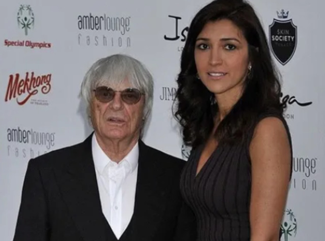 Bernie Ecclestone bersama sang istri, Fabiana Flosi. (foto: twitter.com/Barstoolsports)