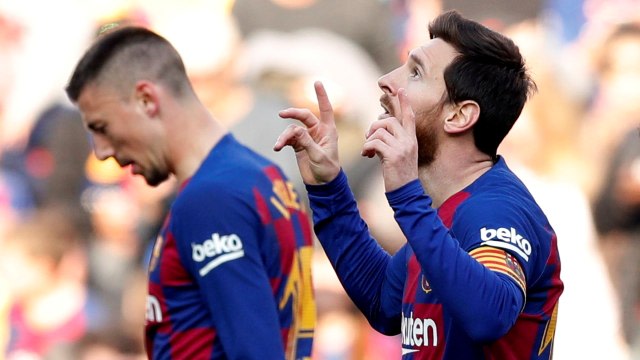 Selebrasi pemain FC Barcelona Lionel Messi usai mencetak gol ke gawang Eibar pada laga lanjutan La Liga Spanyol di Camp Nou, Barcelona, Spanyol.  Foto: REUTERS / Albert Gea.