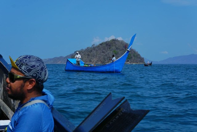 Foto: Aksi Penembak Ikan Berlatar Pesona Perairan Pulo Aceh (31542)