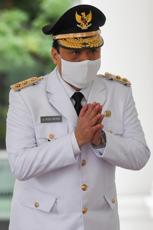 Wakil Gubernur DKI Jakarta Ahmad Riza Patria tiba di Istana Merdeka untuk dilantik di Jakarta, Rabu (15/4/2020). Foto: ANTARA FOTO/Hafidz Mubarak A/POOL