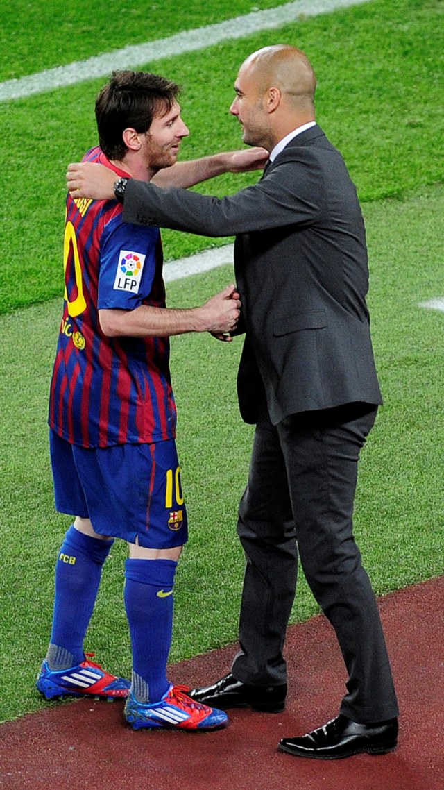 Lionel Messi dan Pep Guardiola. Foto: JOSEP LAGO / AFP
