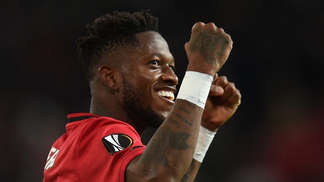 Fred merayakan kemenangan Manchester United atas Club Brugge di Liga Europa. Foto: AFP/Oliver Scarff