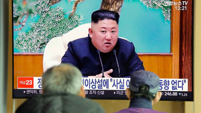 Pemimpin Tertinggi Korea Utara, Kim Jong-un di layar televisi. Foto: REUTERS/Heo Ran