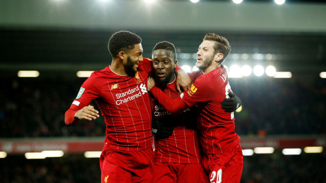 Para pemain Liverpool merayakan gol Divock Origi (tengah). Foto: Andrew Yates/Reuters