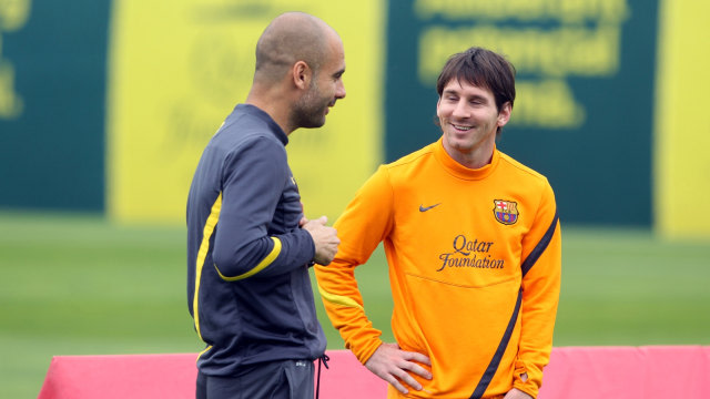 Lionel Messi dan Pep Guardiola. Foto: MIGUEL RUIZ / FCBARCELONA / AFP