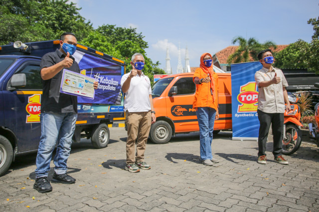 Dukung Mobilitas Logistik di Tengah Pandemi, Top 1 Sumbang Masker dan Pelumas (78177)