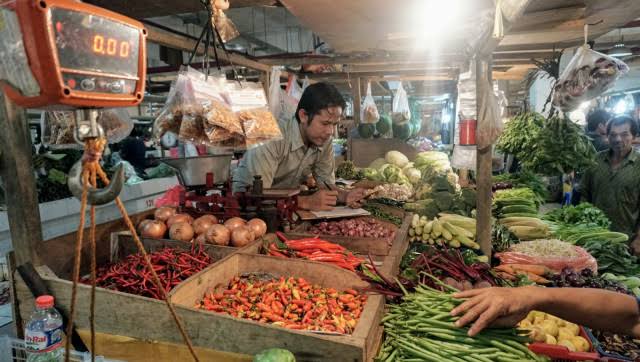 Ilustrasi pedagang di pasar tradisional. Foto: Kumparan.