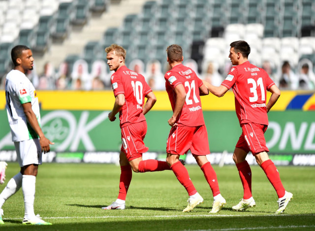 Sebastian Andersson merayakan gol ke gawang Borussia Moenchengladbach. Foto: Martin Meissner / POOL / AFP