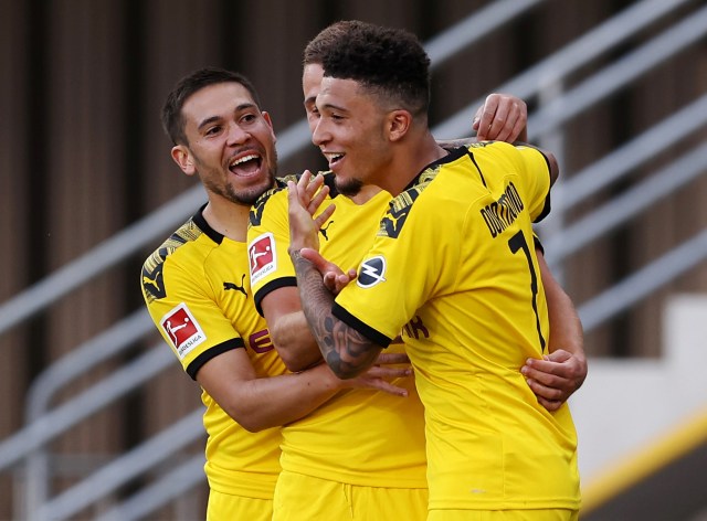 Pemain Borussia Dortmund merayakan gol. Foto: Reuters