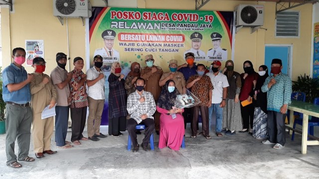 Cerita Warga Desa Pandau Jaya, Riau, Memanusiakan Pasien Positif COVID-19 (543)