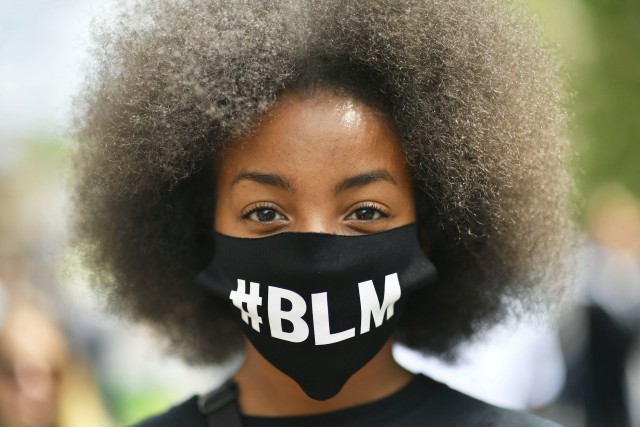 Peserta aksi Black Lives Matter. Foto: AP Photo via PA/Ben Birchall