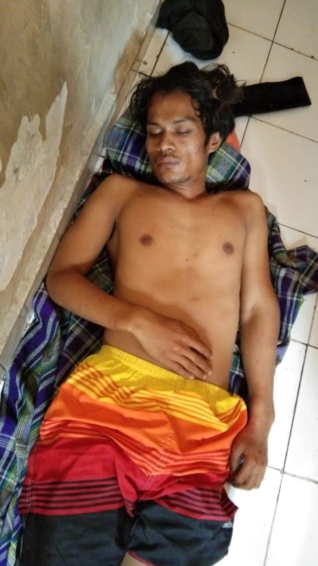 Basri, penebas kepala dua bocah di Luwu Utara saat diamankan di Polres Luwu Utara. Foto: Dok. Istimewa