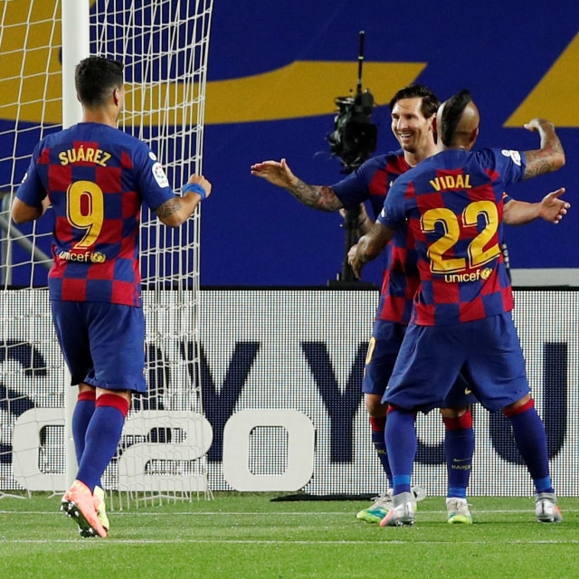 Lionel Messi merayakan golnya ke gawang Leganes. Foto: REUTERS/Albert Gea
